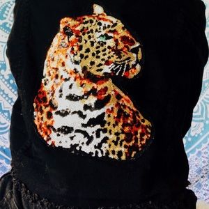 Black denim jacket with sequin leopard on back